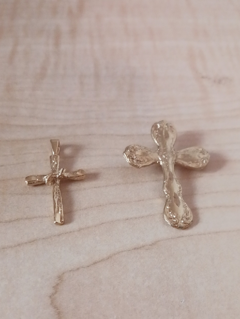 Source Unknown Gold Tone Cross Pendant Pair Plus 1 Additional Charm and A Pin.